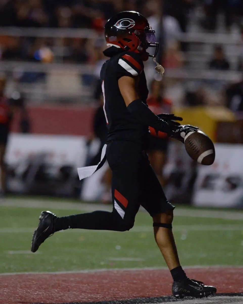 Centennial cornerback Tayten Beyer returns an interception for a pick-six against Mater Dei Friday.