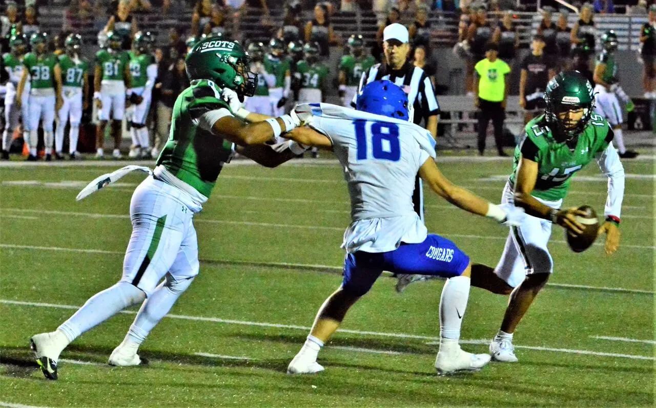 Corona Local Sports 9-22. Jurupa Valley’s Joaquin Huizar (left) and Norco’s Tyler Dejongh (right) eye a pass coming into Huizar. The Cougars defeated the Jaguars 11 – 4.
