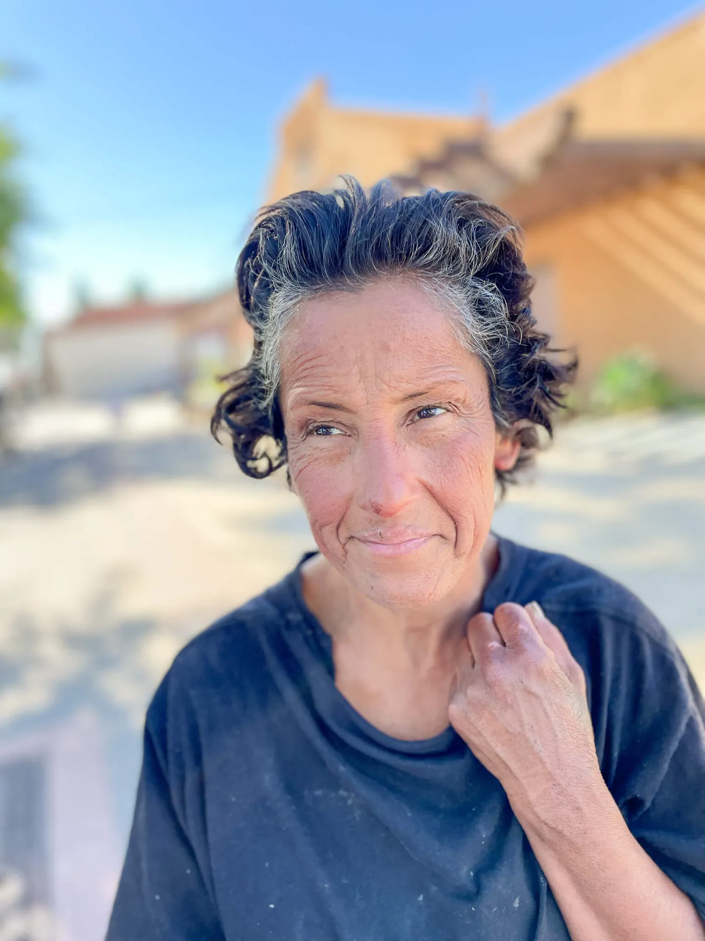 Two days after Denise Bustamante received a sleeping bag, clothing, shoes, and personal hygiene items, she seems to be a different person.
Credit: Photo by Don Ray