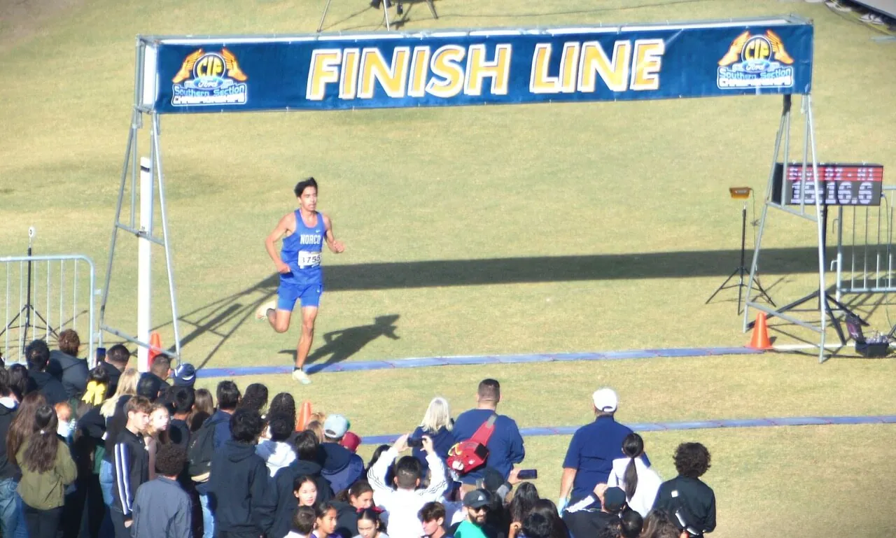 Norco’s Ben Rippe runs in the 3 Mile run at the CIF Prelims last Friday at Mt. San Antonio College. Rippe qualified for the finals this weekend by running the Cal Poly course in 15:16.6. Recently, Rippe shattered a Norco High 3 mile run record held since 1978 by former Norco standout Mike Melendez. Melendez’s previous record run was 14:44. Rippe’s new time was 14:32:18.
Credit: Photo by Gary Evans