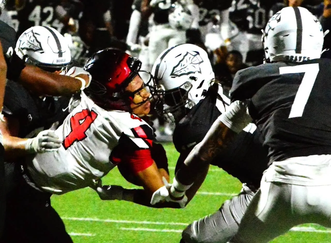 Centennial vs St. John Bosco. After Cornell Hatcher Jr. scored his 5th touchdown of the game, bringing the Huskies within a point of the Braves with only 8 seconds left, Centennial coach Matt Logan, the winningest high school football coach in Riverside County history, opted to go for the win, deciding on a 2-point conversion. Centennial QB Husan Longstreet (center) was taken down shy of the goal line. But Centennial maintained life, recovering the onside kick. From midfield, Longstreet’s first pass was batted down and he was sacked on the final play, of what is an instant classic football game.