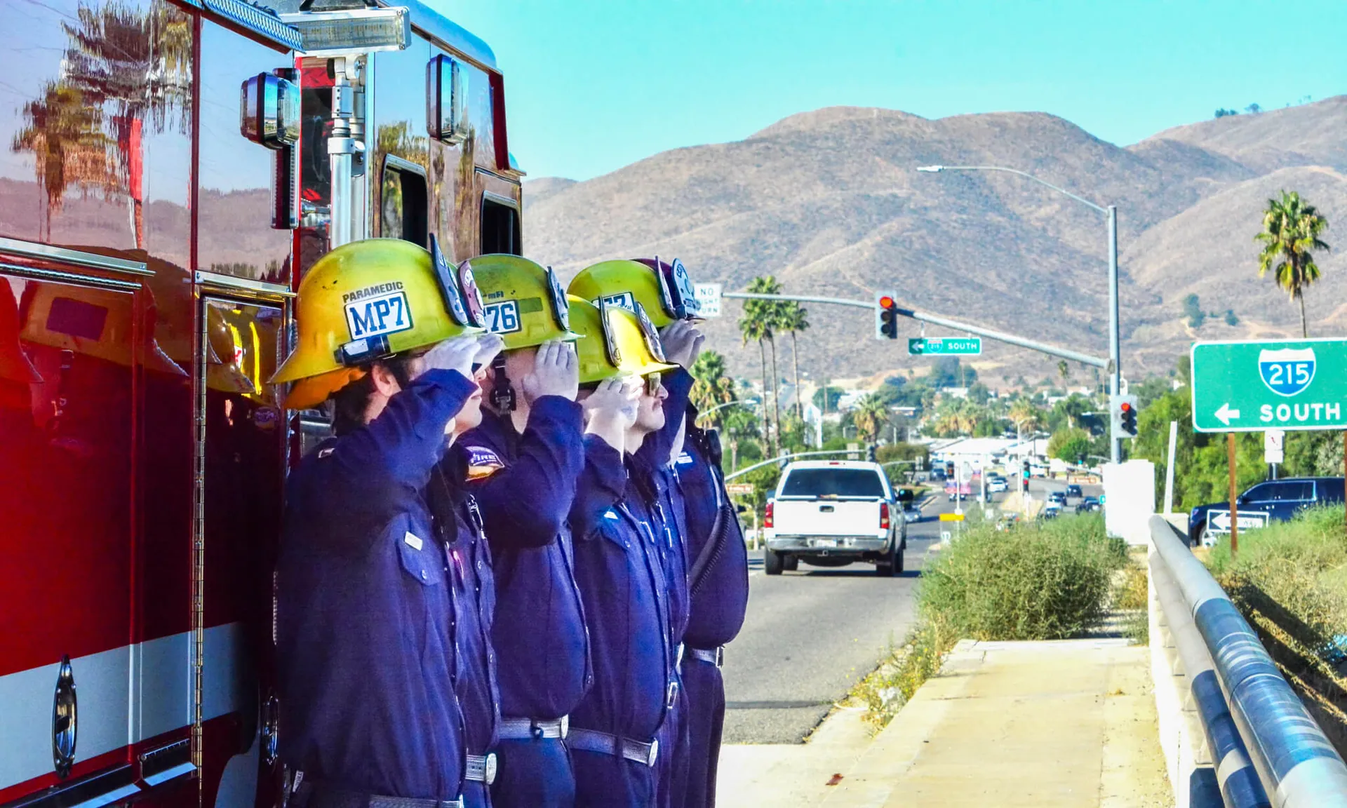 CAL Fire/Riverside County Fireman salute the 9/11 Memorial exhibit on the McCall Blvd Bridge over southbound 215 in Menifee. The exhibit is on display in Temecula through Veterans Day.
Photo by Gary Evans