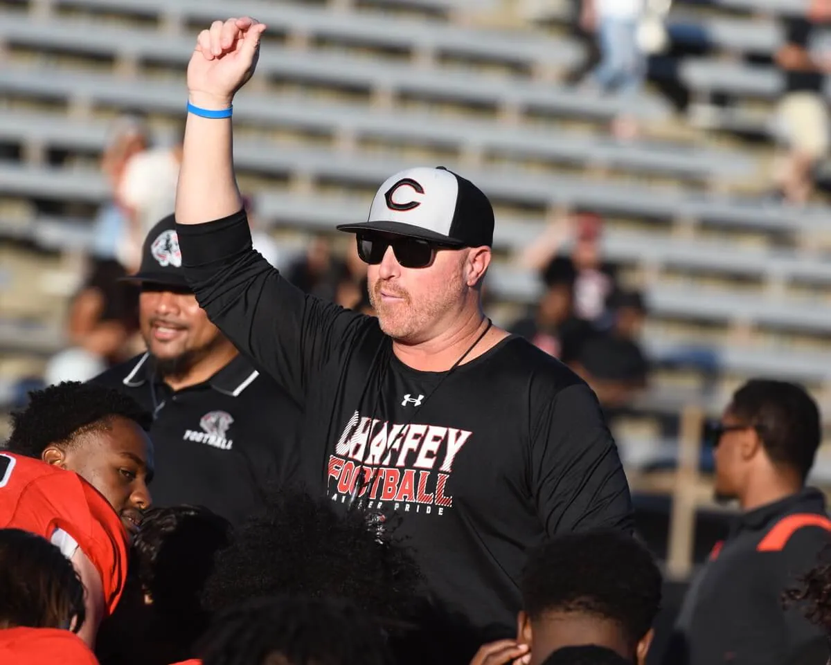 Featured High School Sports Photos and Scoreboard 11-17-2023. Former Corona High star receiver, University of Colorado and NFL player, Darrin Chiaverini salutes his Chaffey College team after it defeated visiting Victor Valley, 48-7, to complete an undefeated, 10-win regular season Saturday. Credit: Photo by Jerry Soifer
