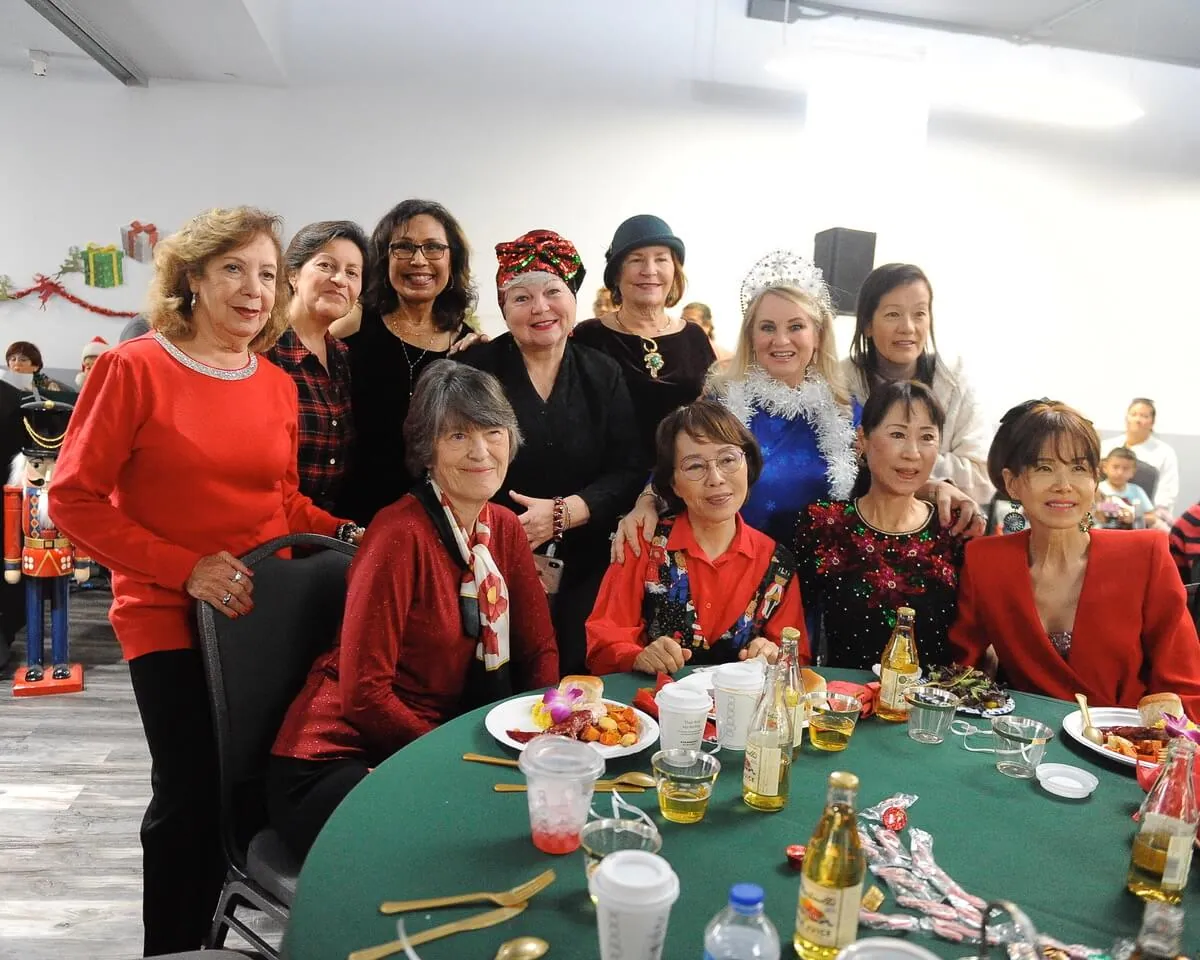 Celebrants at the Corona Senior Center holiday lunch gather for a group photo Wednesday at the Circle City Center. Additional photo, Page 8.
Credit: Photo by Jerry Soifer
