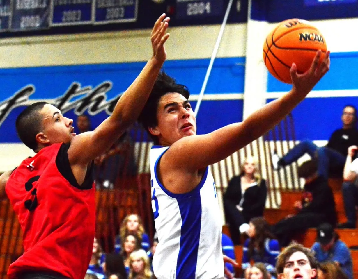 Riverside County High School Sports Featured Photos and Scoreboard 1-12-24Palm Springs guard Jayden Creavalle (3) is a step behind trying to block Norco’s Jose Acosta’s layup. The Indians defeated the Cougars 59 – 57.
Credit: Photo by Gary Evans