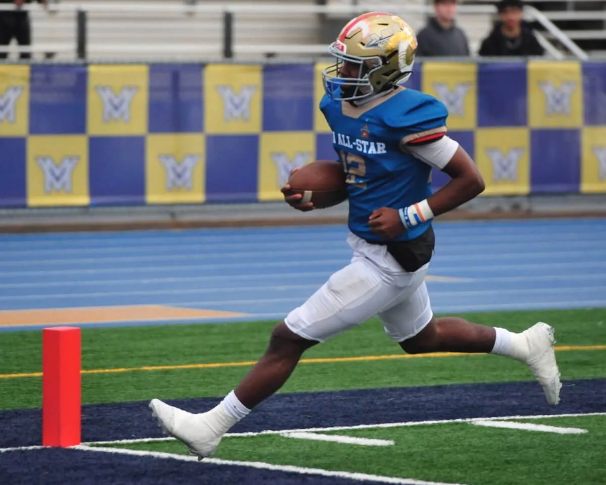 Corona / Norco High School Sports Featured Photos and Score Board 1-26-2024. Quarterback Cameron Shannon, of Riverside North, scores the first touchdown for the North team against the South in the Riverside Sheriffs Association high school all-star game Saturday at Moreno Valley High School. The North prevailed 30-14. Credit: Photo by Jerry Soifer