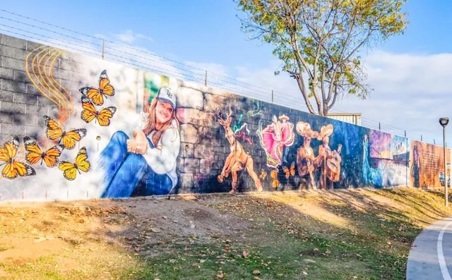 Trinidad Rivera was hands-on, contributing to the mural in the Long Beach park named for his famed mother, singer Jenni Rivera. That caught the eye of artist “Downtown” Daniel Antello, who encouraged Trinidad to study under legendary mentor Doc Guthrie at Los Angeles Trade-Technical College. A youthful passion evolved into a career.
Credit: City of Long Beach @longbeachcity Instagram