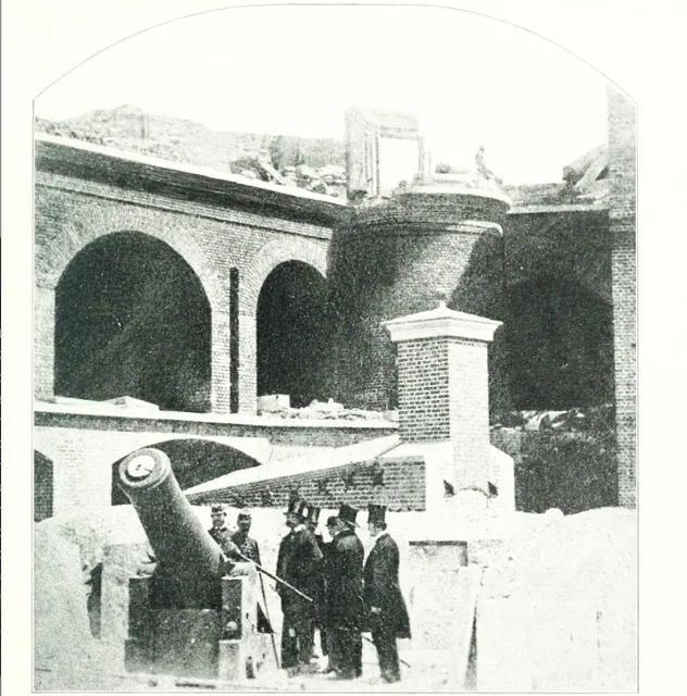April 12. A photographic view of the Hot shot Furnace at right shoulder angle and a 10-in. Columbiad cannon pointing to Charleston; Ft Sumter April 1861 after its surrender. Credit: New York Public Library