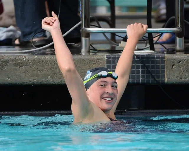 Corona Santiago's Charlotte Wilkie captures the 200-yard freestyle Big VIII League title.