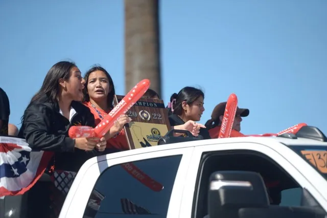 The Corona High girls wrestling team joined the parade with its CIF championship plaque.
Credit: Photo by Jerry Soifer