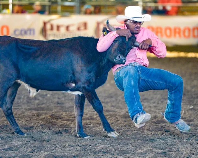 Drew Madden, of Sloughhouse, CA, (Sacramento County) wrestles a steer in 9.2 seconds, good for fifth place. Madded netted $508 for his efforts.
Credit: Photo by Jerry Soifer