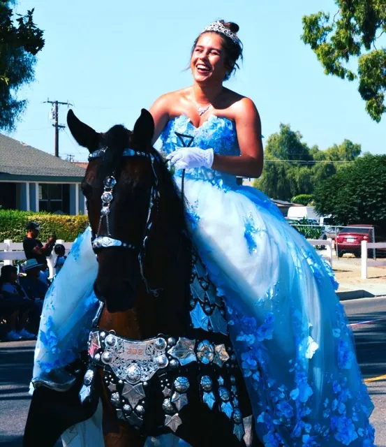 Leilani Centano on her horse Liberty shares a laugh with parade watchers Monday during the 2024 Norco Fair Parade
Credit: Photo by Gary Evans