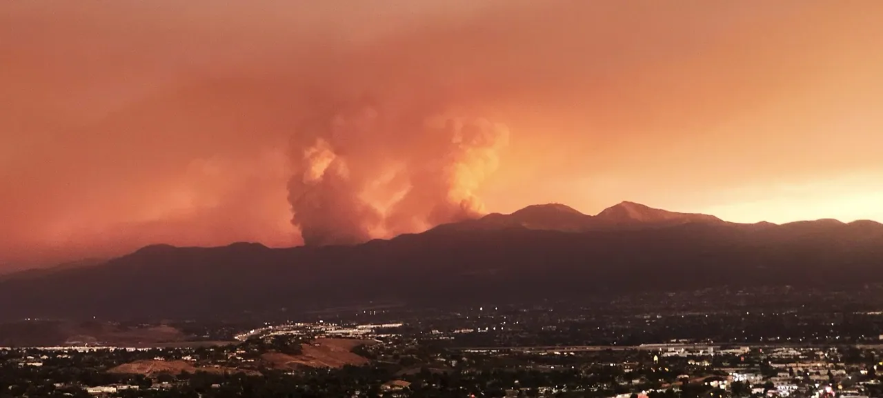 The Airport Fire burns in the Cleveland National Forest above Corona late Monday afternoon. Photo by Gary Evans