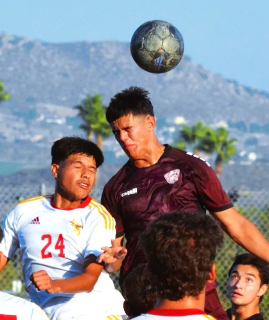 College of the Desert’s Cardiel Rivera-Meza (24) and Norco College’s Tommy Castaneda (Center) battle for a corner kick in the crease. Castaneda’s header bounced off the cross bar, and enabled teammate Yuya Oikawa to score on a header of his own.
Credit: Photo by Gary Evans