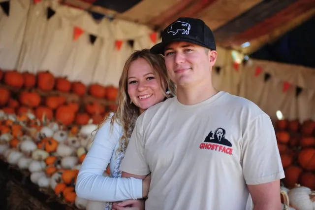 Melody and Spencer Lewis from Lake Elsinore enjoy a Halloween pump patch stroll.
Credit: Photo by Jerry Soifer