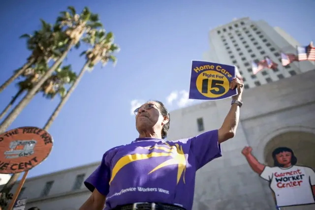 Fast food workers and their supporters join a nationwide protest for higher wages and union rights outside City Hall in Los Angeles on Nov. 10, 2015.
Credit: Photo by Lucy Nicholson, Reuters