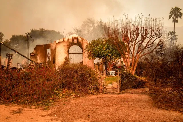California Homeowners. The remains of a smoldering home in an Altadena neighborhood affected by the Eaton Fire on Jan. 8, 2025. California's insurer of last resort is facing $1 billion in losses from Southern California wildfires. Credit: Photo by Jules Hotz for CalMatters