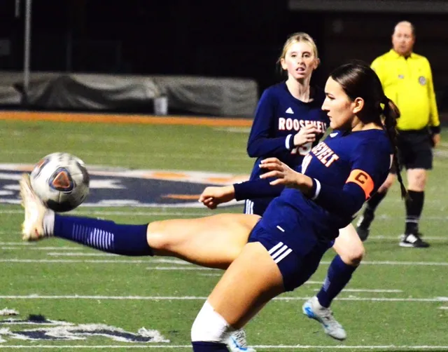 Eastvale Roosevelt’s Siena Salazar (10) starts a bicycle kick on goal against Westlake while teammate Avery Mendez (19) watches. The Warriors defeated the Mustangs 2 – 0 in the CIF playoffs.
Credit: Photo by Gary Evans