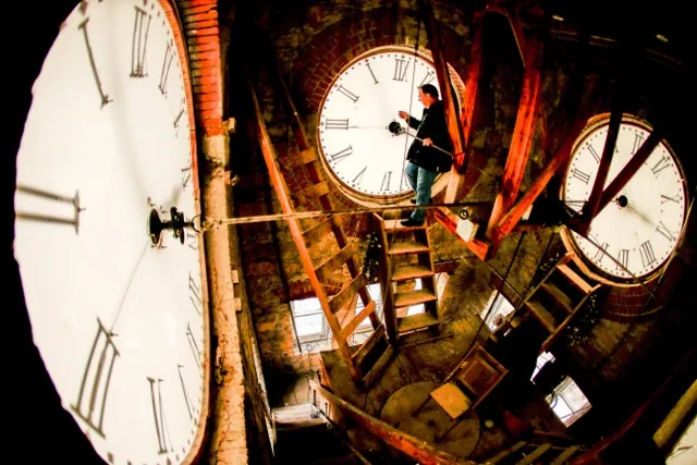 Daylight Saving Time. Custodian Ray Keen inspects a clock face before changing the time on the 100-year-old clock atop the Clay County Courthouse, March 8, 2014, in Clay Center, Kansas.  Credit: (AP Photo/Charlie Riedel, File)