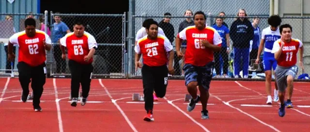 Corona High Unified Track student-athletes participate in 100-yard dash at Norco High. (L-R) Hiro Shelton, Emmanuel Mendoza, Karim Gonzalez, Zander Noflin, and Gael Linares