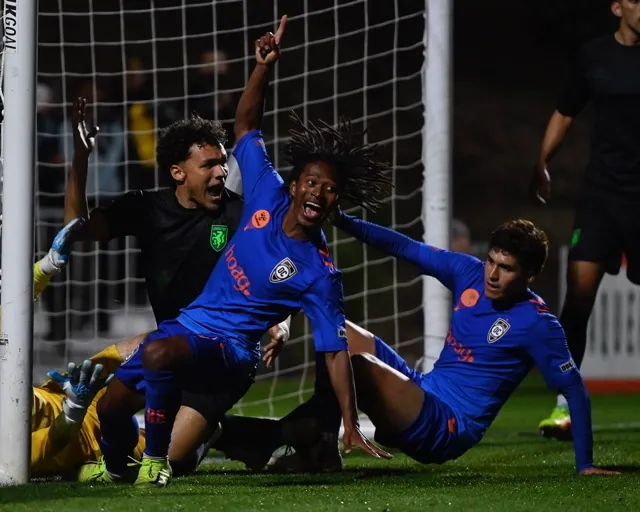 Orange County Soccer star Mohamadou War exults Saturday after he scores a last-second goal gaining the 2-all tie in a USL match at Great Park in Irvine.