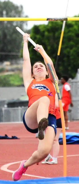 Roosevelt’s Lucy Munoz takes off on the pole vault during the track meet at Norco.
Credit: Photo by Gary Evans