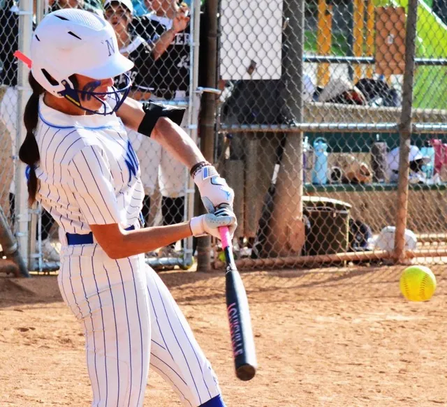 Norco’s Leighton Gray blasts a 2 run home run during the Cougars’ 5 – 1 victory over St. Francis during the Michelle Carew tournament.
Credit: Photo by Gary Evans