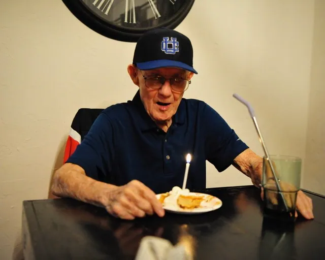 Retired Corona High baseball coach Lyle Wilkerson celebrates his 92nd birthday Friday by blowing out a candle at a party put on by John and Kristie Melendez in El Cerrito attended by 10 close friends.
Credit: Photo by Jerry Soifer
