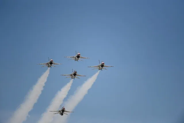 Five members of the U.S. Air Force Thunderbirds flight demonstration team arrive at the March Air Reserve Base for last weekend's performances.