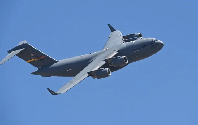 A C-17 transport plane takes off from the March Air Reserve Base Friday.