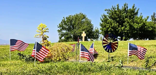Cap: American Flags grace the grounds of Crestlawn Memorial Park in Riverside on Memorial Day.
Credit: Photo by Gary Evans