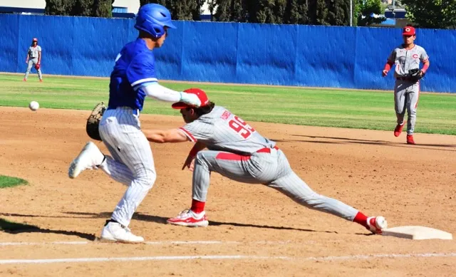 Norco’s Zion Martinez (left) digs for first while Corona first baseman Gavin Flores stretches for the throw from shortstop Billy Carlson for the out. In the background, centerfielder Anthony Murphy and second baseman Trey Ebel watch. Top-seeded Corona was upset in the semi-final by St John Bosco.