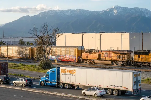 Inland Empire. Caption: A truck drives past an Amazon sort center in Mira Loma on April 4, 2023. Credit: Photo by Aryana Noroozi for Black Voice News / CatchLight Local