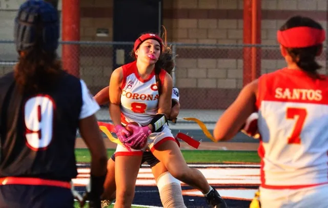 Corona’s Isabella Acosta (8) catches the game-tying touchdown pass against Riverside King.  Down 12-0, the Panthers’ two-point conversion sealed a come-from-behind 14 – 12 win over the Wolves. 