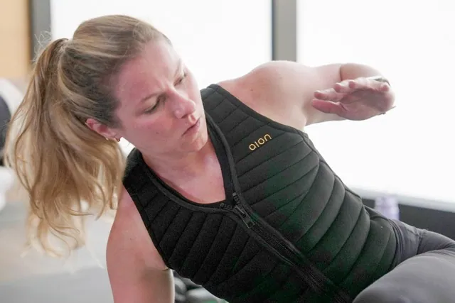 Weighted vests. Nora Capocci wears a weighted vest during an MB360 workout class at the Life Time health club in New York on Wednesday, Aug. 13, 2025. Credit: AP Photo/Shelby Lum