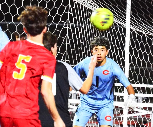 Corona’s Martin Nunez (5) and Corona Centennial’s Johnny Soto (center) watch as the ball goes through the crease in front of goalkeeper Chris Salazar (1) during the Panthers’ 1 – 0 victory over the Huskies.