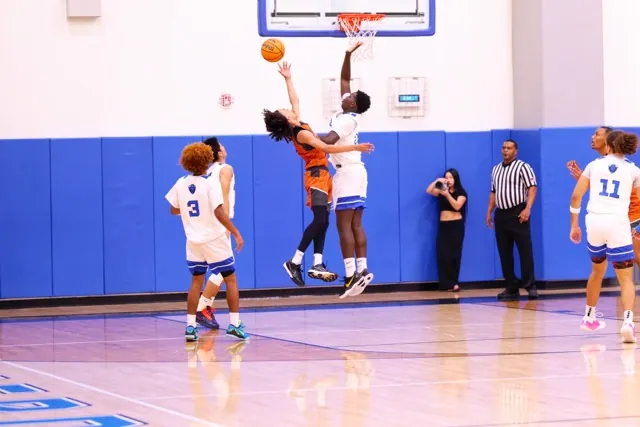 Orange Vista’s #5 Dylan Avila is fouled hard while going for a layup off a fast break