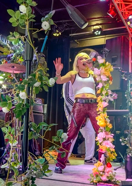 Singer Andrea Esperanza Martinez from Just a Girl, a No Doubt tribute band, performs for a multigenerational audience at “The Vibe” in Temecula.