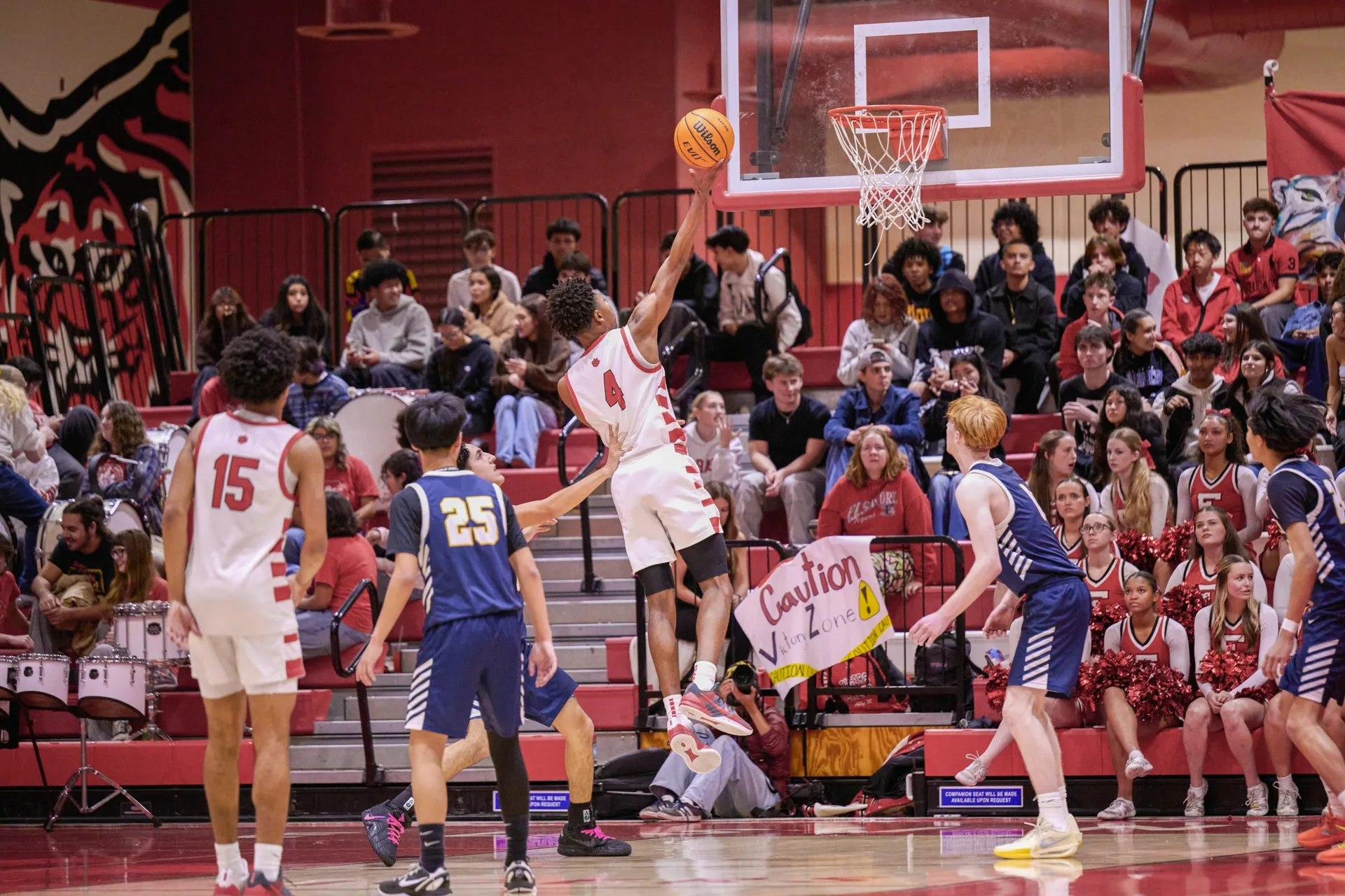 Elsinore’s #4 Nasir Bates slices through the defence to get an easy layup. Photo by Marcus Walker