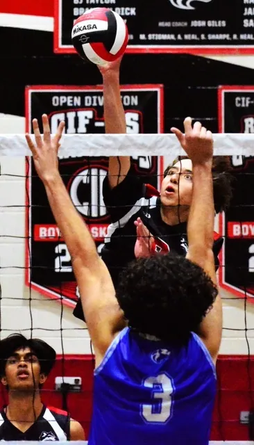Corona Centennial’s Indy Ledford (top) eyes his shot over Norco’s Brycen Ruggio (3) during the Huskies 3 – 2 victory over the Cougars.