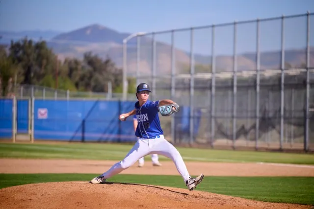 Liberty’s Salvador Sandoval (#17) prepares to unleash a 2 seam fastball