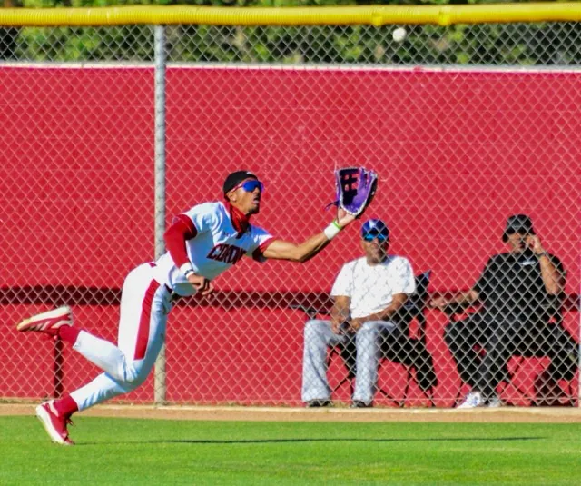 Corona centerfielder Anthony Murphy makes a spectacular catch against Norco in Monday’s game. The teams meet again today, Friday, and Norco has a league game VS King on Monday. One Cougar win will clinch the league title outright. Two Norco losses would create a shared title with Corona.