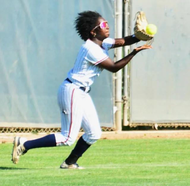 Eastvale Roosevelt’s Alexis Willis makes a running catch.
