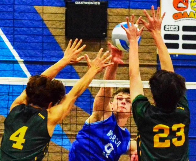 Norco’s Ryan Ibbetson (9) blasts a shot past Brea-Olinda’s Jeremiah Ammerman (4) and Jacob Sim (23) during the Wildcats 3 – 1 CIF second-round playoff victory over the Cougars.