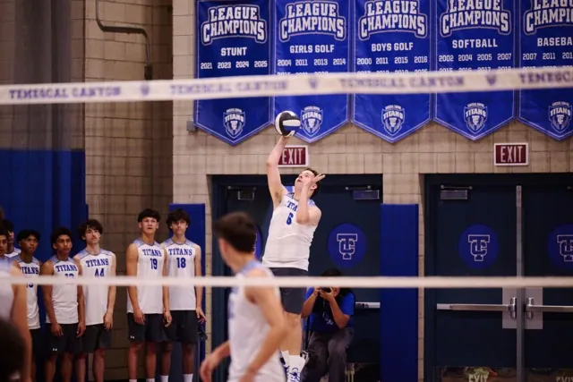 Titan setter Mason Peterson (#6) displays perfect form, lofting a high ball for his hitters during the Quarterfinal matchup. Peterson’s distribution was key to the Titans' 25-16, 25-19, 25-23 sweep of the Rangers.