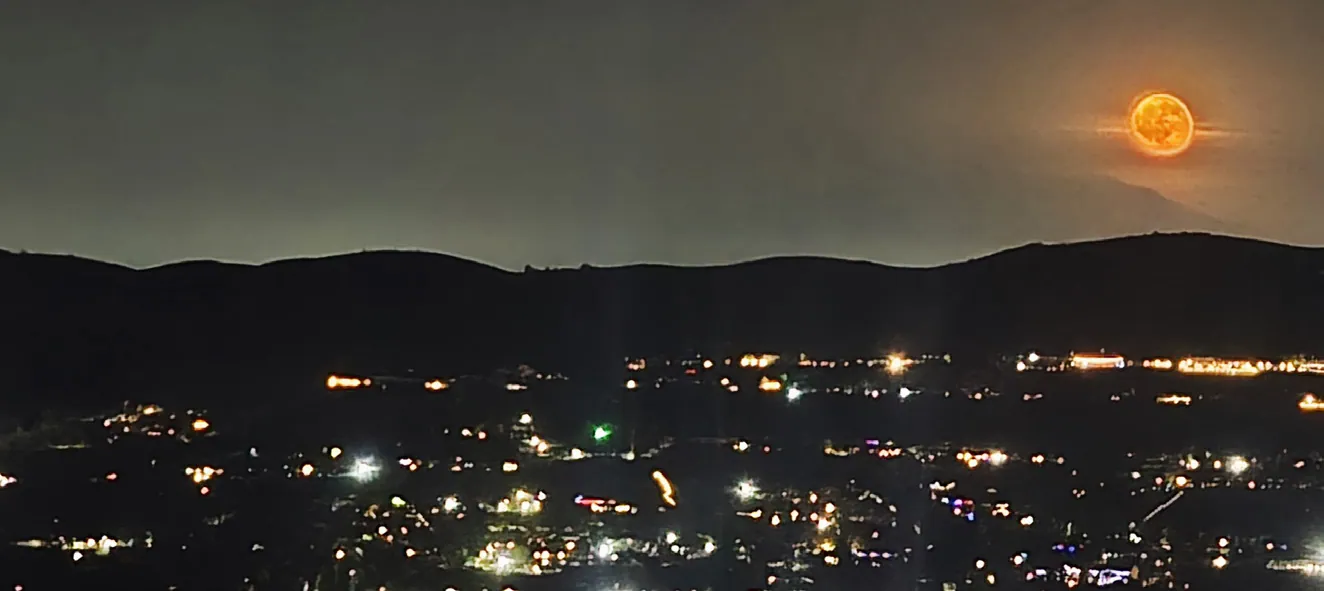 “The Buck Moon” rising above the IE as viewed from Beacon Hill. While there are differing interpretations for various traditions, “Buck” references the antlers of male deer which are in full-growth mode in July aftfter their annual shedding.