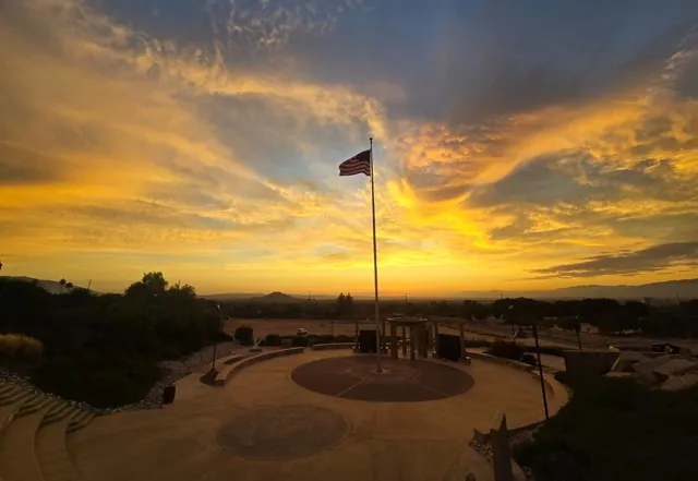 The George A. Ingalls Memorial silhouettes as the sun sets on the Norco horizon.
Credit: Photo by Gary Evans