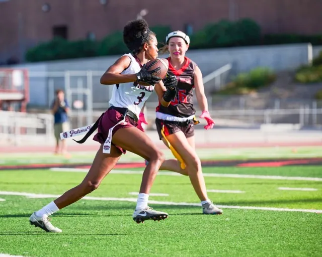 Paloma Valley’s #3 Cadyn Evans turns upfield with the ball as a Murrieta Valley defender pursues