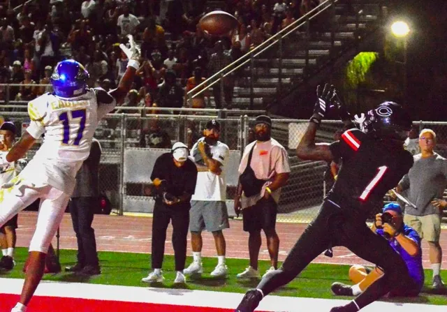 Rancho Santa Margarita defender Rayshawn Brandon (17) just misses deflecting Corona Centennial QB Jaden Jefferson’s touchdown pass to Quentin Hale (1). The Eagles nipped the Huskies 21 – 20 in a rematch of last season’s CIF Division 1 Championship game won by Rancho 42 – 7.