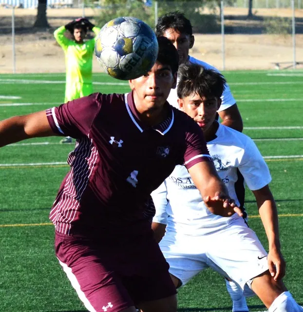 Norco College’s Miguel Rocha (4) eyes the ball before taking a shot on goal during the Mustangs 2 – 1 loss to LA Mission College.